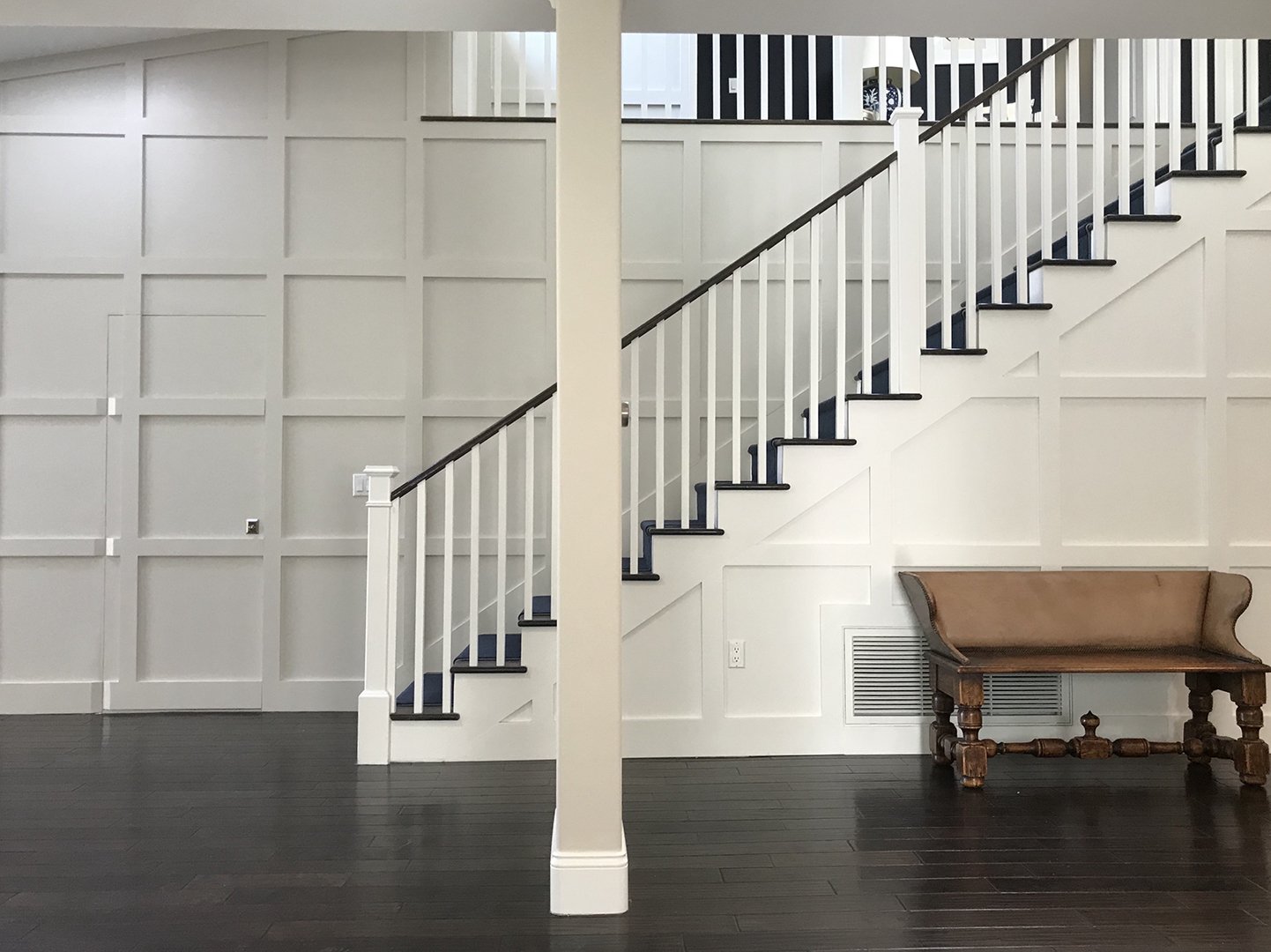 Living room staircase of Brentwood luxury home, modern traditional interior design by Stephen Pappas Interiors, West Hollywood