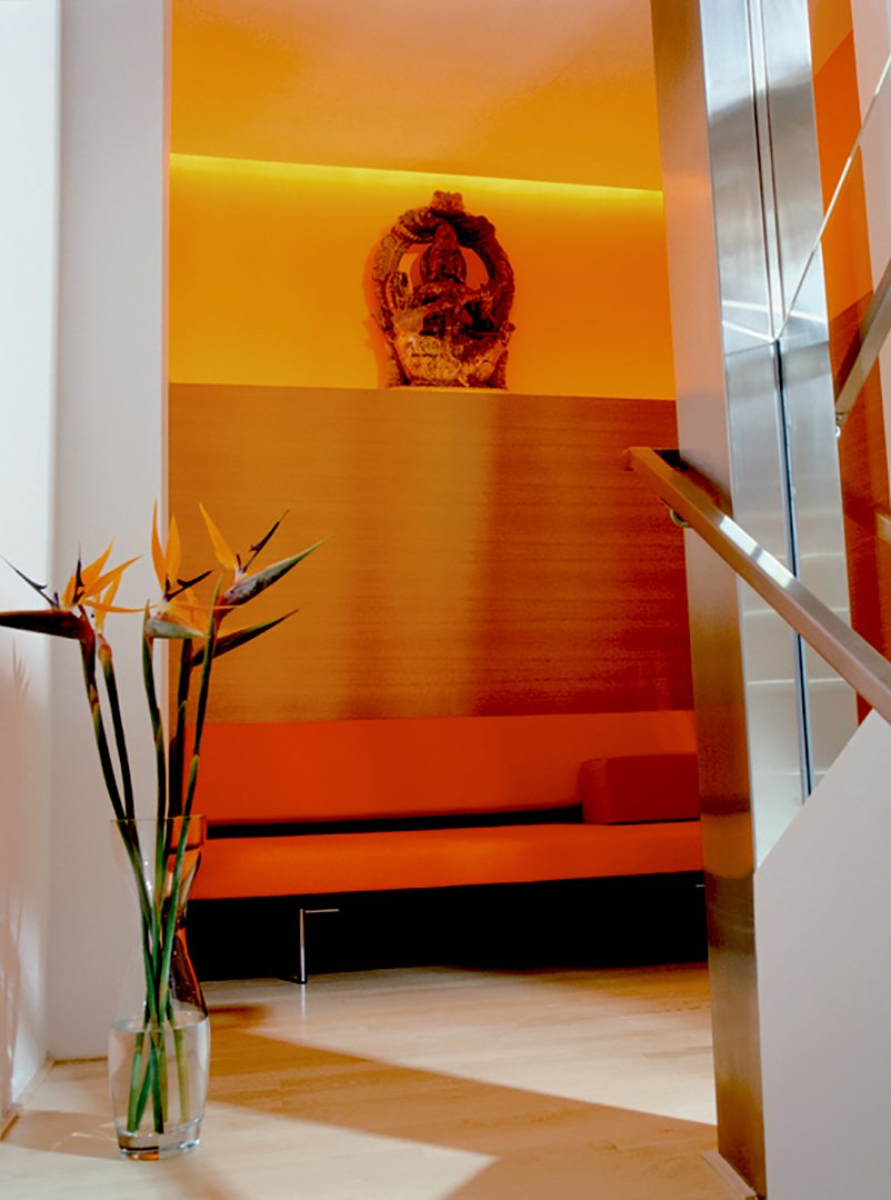 Glass and stainless steel three-level staircase of Mulholland Drive modern home featuring open design and minimalist styling, full-service interior design by Stephen Pappas Interiors, Los Angeles