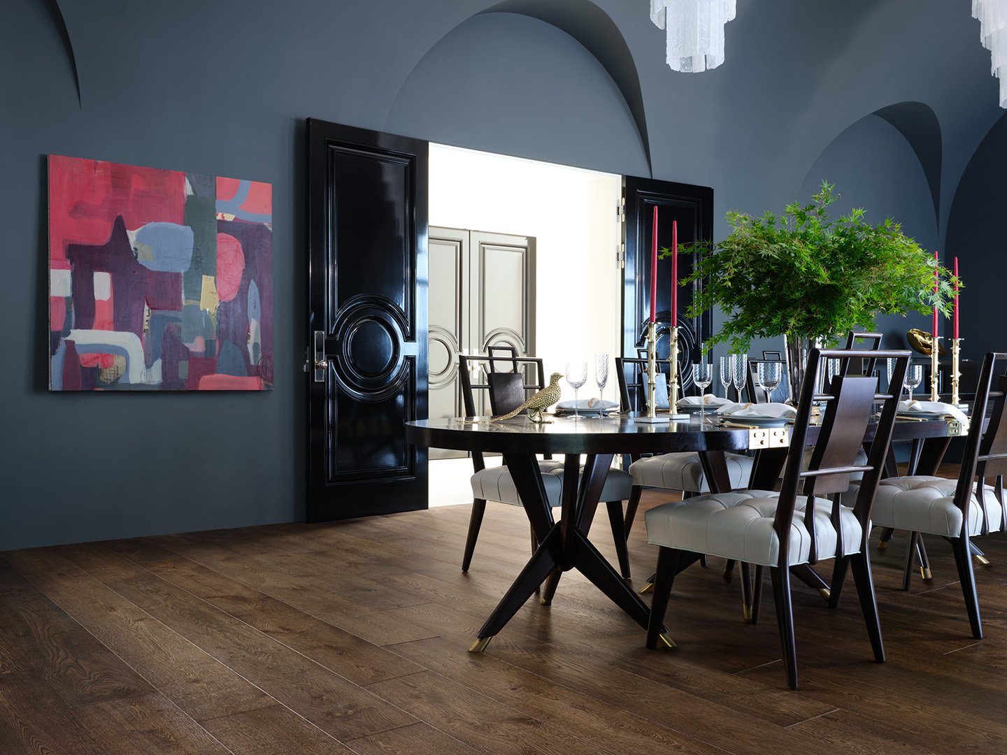 Interior styling of a modern dining room for California Classic Floors featuring custom dining furniture, rich painted walls and a colorful abstract painting, styled by Stephen Pappas Interiors, photographed by Roger Davies