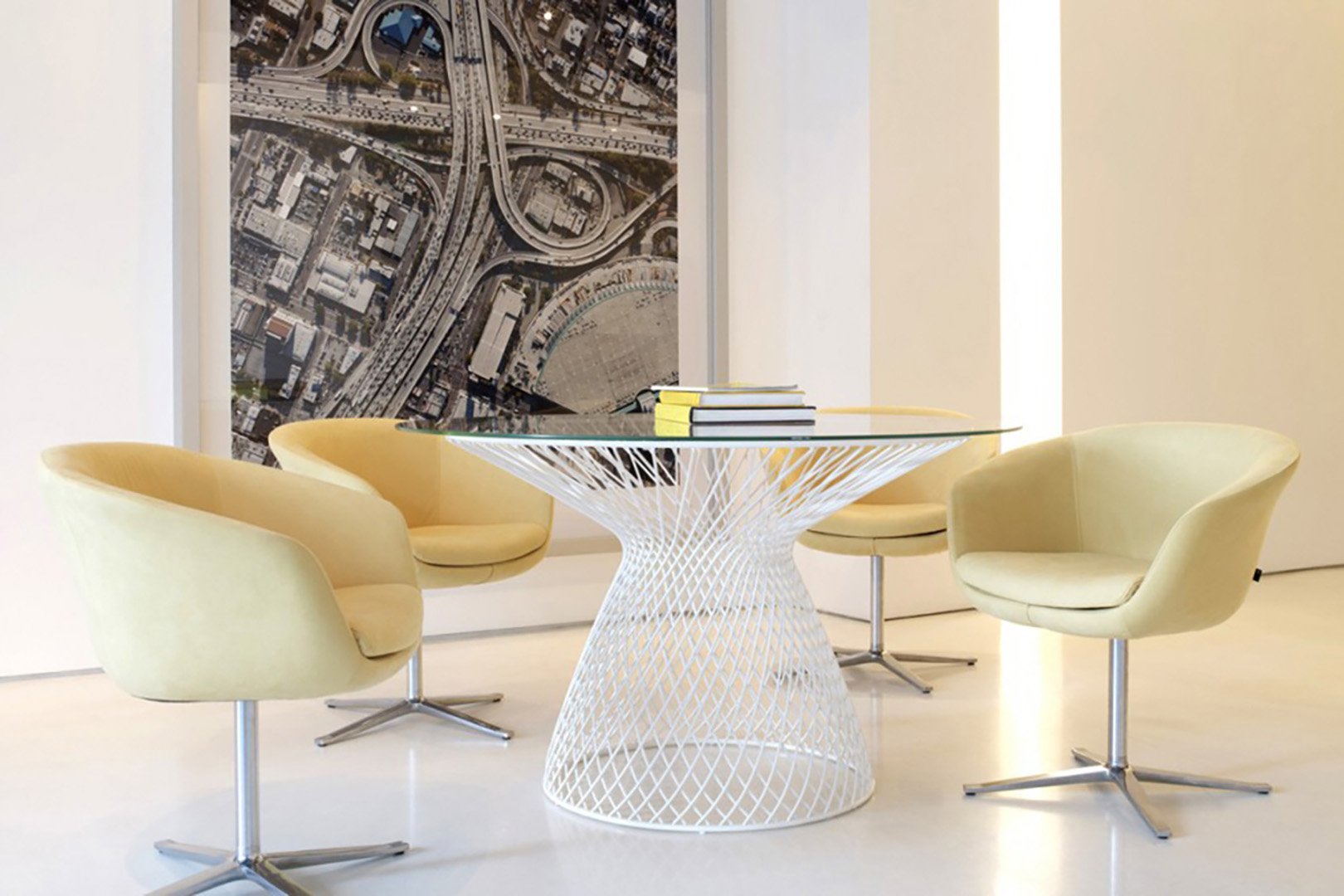 Close-up styling detail for Coalesse showcasing modern workplace furniture with curated art and accessories, styled by Stephen Pappas Interiors, photographed by Noah Webb